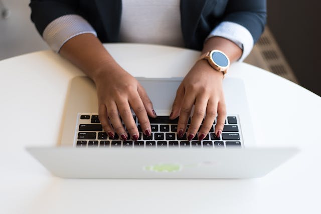 person%20typing%20on%20a%20laptop person%20typing%20on%20a%20laptop